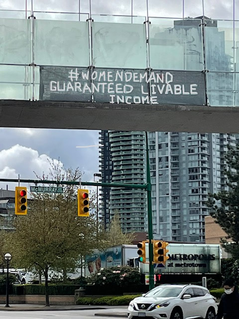 #womendemand Guaranteed Livable Income. Banner Metrotown Burnaby